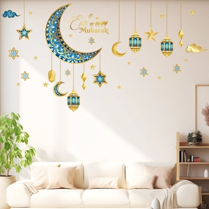 Detail of 3D Eid Mubarak wall stickers featuring blue moon, gold stars and lanterns