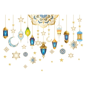 Detail of Ramadan lantern wall stickers with moon and star patterns in gold and blue