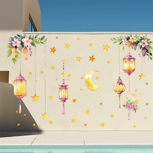 Detail of watercolor Ramadan wall stickers featuring lanterns and stars on exterior wall