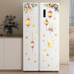Detail of watercolor lantern and star wall stickers applied on a white refrigerator surface