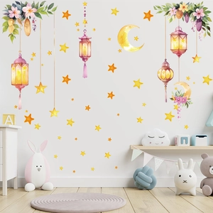 Detail of watercolor lanterns and stars wall decals in a cozy children room setting