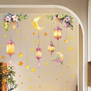 Detail of Ramadan wall stickers featuring golden moon, stars, and lanterns on a beige wall