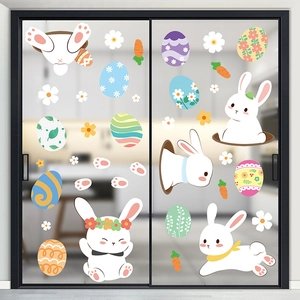 Easter bunny and colorful eggs window static stickers applied on a glass sliding door