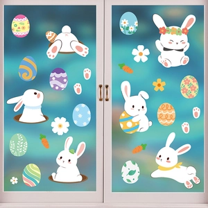 Detailed view of colorful Easter bunny and egg static window stickers on a glass door