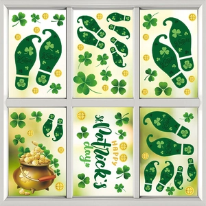 St. Patrick's Day window decals with green shamrock footprints and gold coin pots on glass