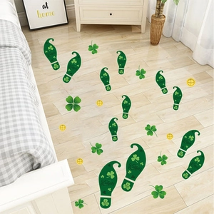 Green St. Patrick's Day floor decals with shamrocks and elf footprints on wood