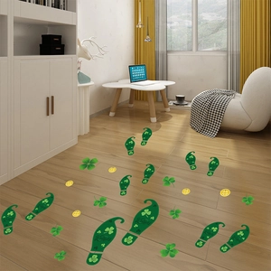 St. Patrick's Day floor stickers with green leprechaun footprints and clovers on wood floor