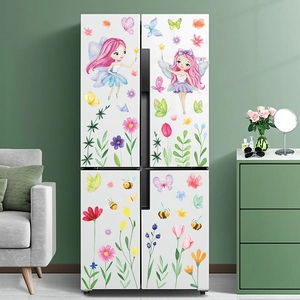 Spring fairy and flower glass window stickers with butterflies on a white refrigerator