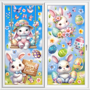 Easter window stickers with bunny, colorful eggs and flowers on a sunny window background