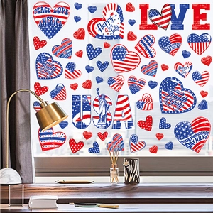 Independence Day window clings featuring USA flag heart patterns and patriotic text motifs
