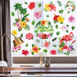 Detail of Hawaii coconut tree and flamingo static window stickers on a glass window