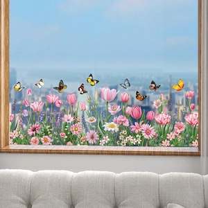 Detail of floral wall stickers with butterflies applied on window glass for home decor