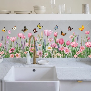 Kitchen backsplash detail with floral butterfly wall stickers and marble texture