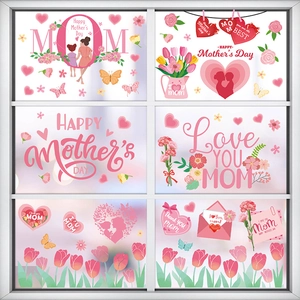 Detail of Happy Mother's Day window clings with floral designs and silhouettes on glass