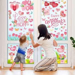 Cozy home setting showing Mother's Day window decals with pink hearts and flowers