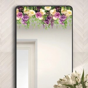 Detail of floral window film featuring colorful rose vines on a modern mirror top
