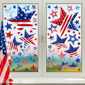 Close-up of patriotic star window clings with American flag patterns on glass panes