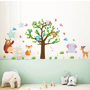 Detail of colorful cartoon forest animal wall stickers with tree and storybook signs