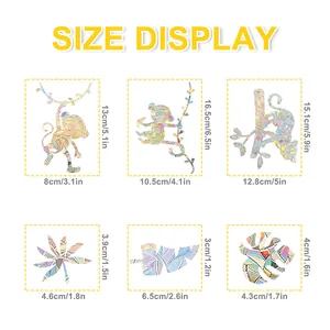 Size chart showing dimensions for monkey and leaf prism window clings in cm and inches