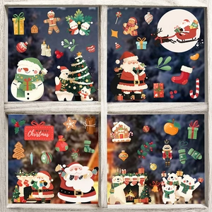 Detailed Christmas window decals showing Santa, polar bears and trees on a glass pane