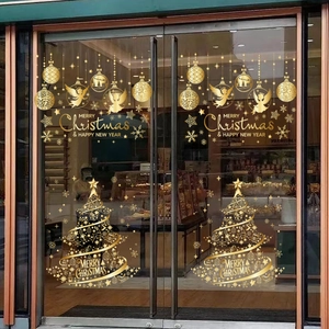 Golden Christmas tree static window decals with festive bells and holiday greetings