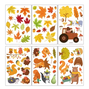 6 sheets of Thanksgiving window clings with autumn animals, maple leaves, and pumpkins