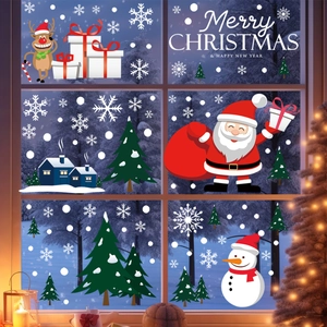 Christmas window clings set featuring Santa Claus, snowman and reindeer on glass pane