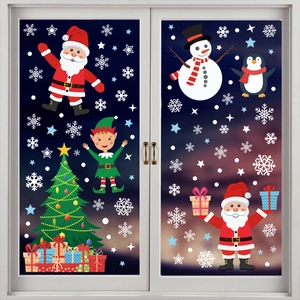 Christmas window stickers featuring Santa, snowman, and tree on a snowy night background