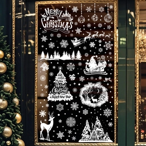 White Christmas window stickers featuring Merry Christmas text, snowflakes and reindeer
