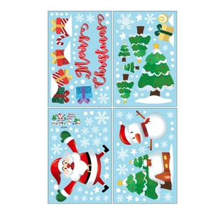 Set of four Christmas static window stickers featuring Santa Claus and snowman motifs