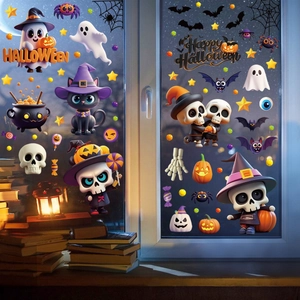 Close-up of Halloween window decals featuring cartoon pumpkins and ghosts on glass surface