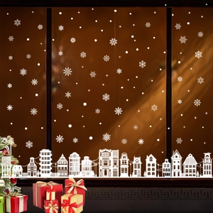 White Christmas window decals featuring snow city silhouettes and snowflakes decoration