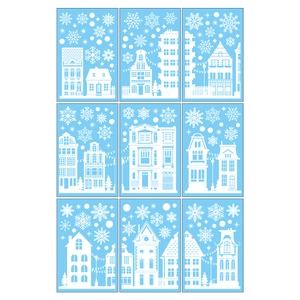 Set of 9 white winter city silhouette window stickers with snowflake and building designs