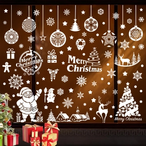 White Christmas window decals set featuring Santa, reindeer and snowflakes for glass decor