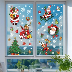 Festive Christmas window decals featuring Santa, elves and tree for glass decoration