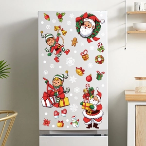 Christmas refrigerator stickers with Santa, elf, and gift box decals on a white fridge