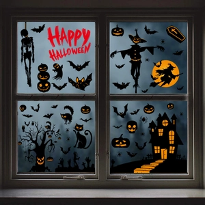 Detail of Halloween window decals featuring ghosts, pumpkins, and a haunted castle silhouette