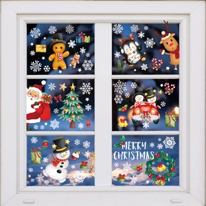 Detail of Christmas window clings featuring snowman and reindeer on glass background