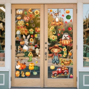 Autumn window stickers with pumpkin, scarecrow and vintage truck on glass doors