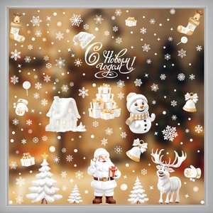 Macro detail of white snowflake and Santa Claus decals on a festive glass window