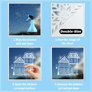 Detail showing double-sided Christmas window stickers with snowflake and house patterns