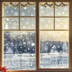 Christmas window decals with snowmen and snowflakes on glass for holiday party decor