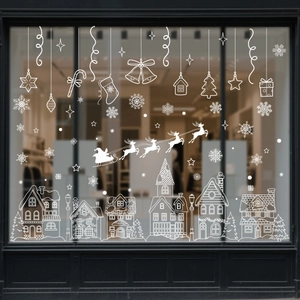 White Christmas window decals featuring snow houses and Santa sleigh for home decoration