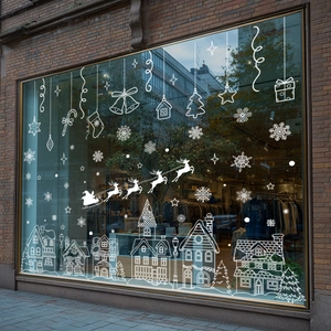 White Christmas window decals with Santa sleigh and snow houses for holiday glass decoration