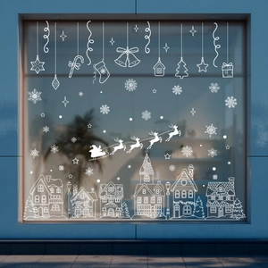 White Christmas window decals featuring Santa sleigh and European village silhouette