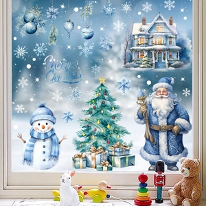 Détail de stickers de Noël bleus avec Père Noël et bonhomme de neige pour décoration vitre