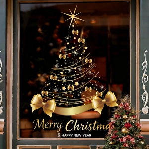 Close-up of golden Christmas tree window decal with Merry Christmas and Happy New Year text