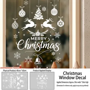 Detail of white Christmas window stickers featuring reindeer, snowflakes and festive trees