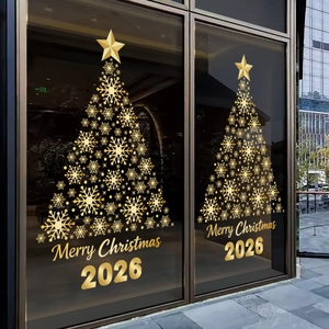 Golden snowflake Christmas tree window sticker with Merry Christmas 2026 text on glass