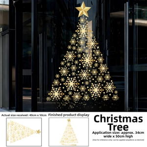 Detail of golden snowflake Christmas tree window sticker with Merry Christmas text